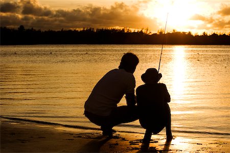 625-00901996
Model Release: Yes
Property Release: No
Silhouette of a father and his son fishing
